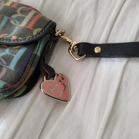 Dooney & Bourke Multi Scribble Wristlet With Strap And Signature Heart Charm